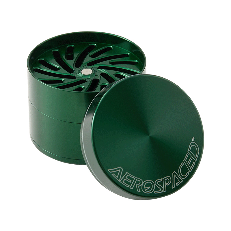 User  demonstrating the grinding process with the toothless herb grinder, showing ease of use and efficient material handling.