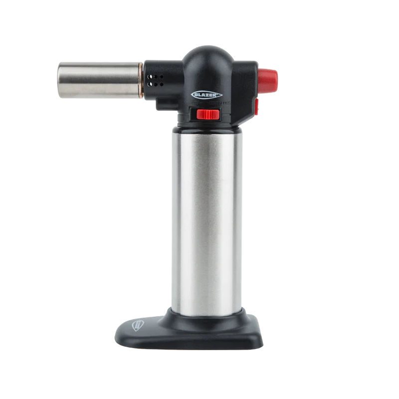 DIY enthusiast using a craft torch for detailed craft work