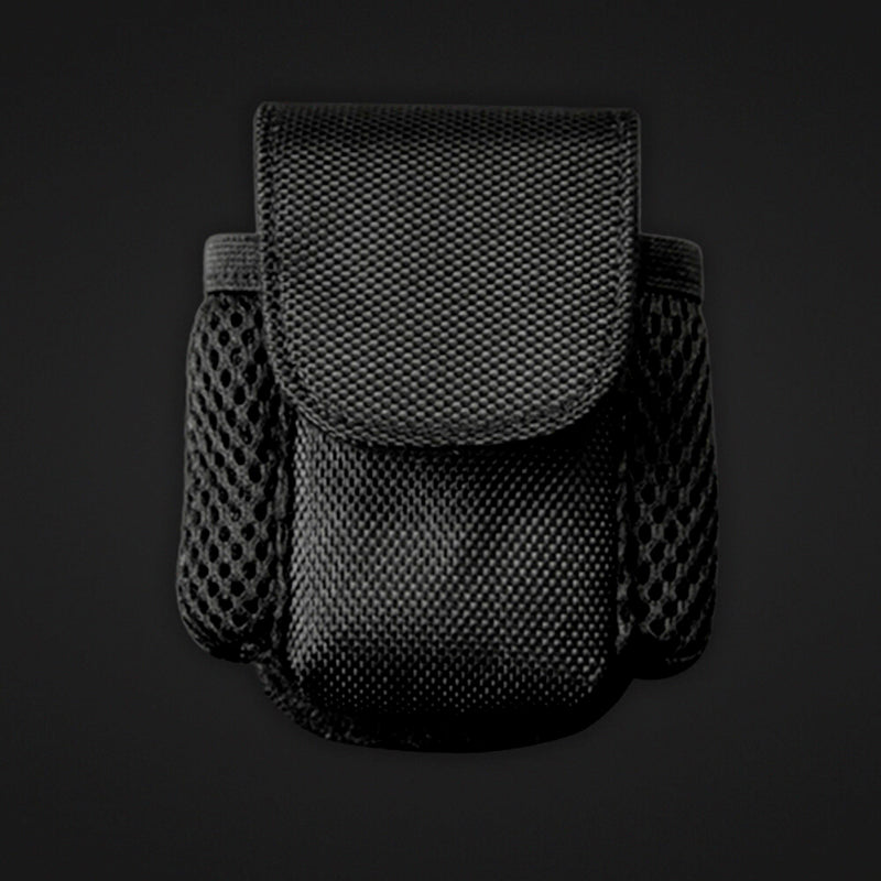 Front view of vaporizor case clipped to belt in outdoor setting