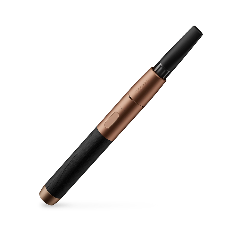Close-up of the Vessel Wood Series 510 thread vape battery highlighting its unique wood finish.