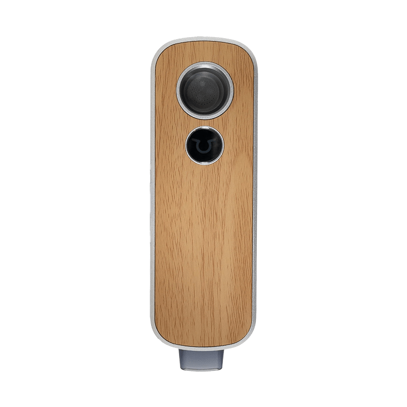 Close-up of the Firefly 2+ vapor path and bowl, demonstrating its premium build quality.