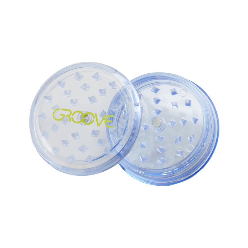 Herb grinder in use, grinding fresh herbs for on-the-go use