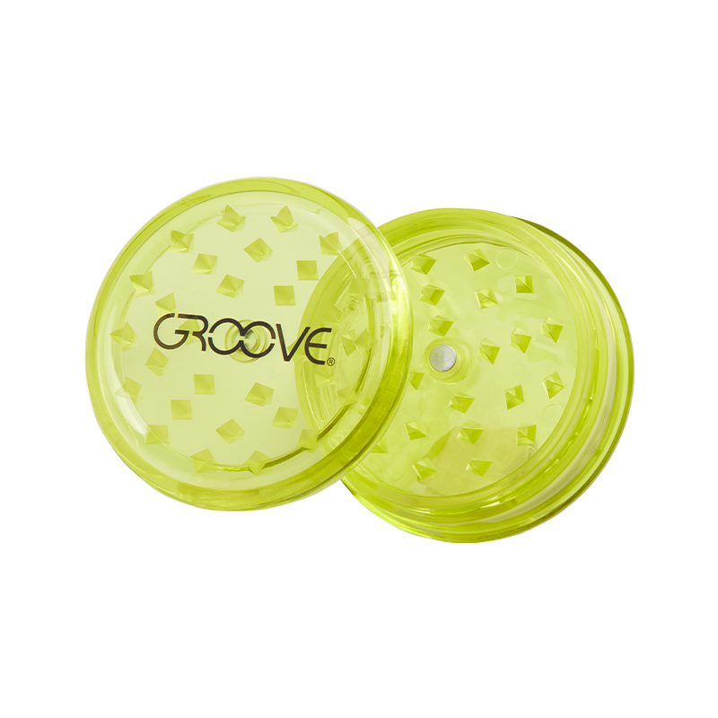 Colorful portable acrylic grinder packed for travel
