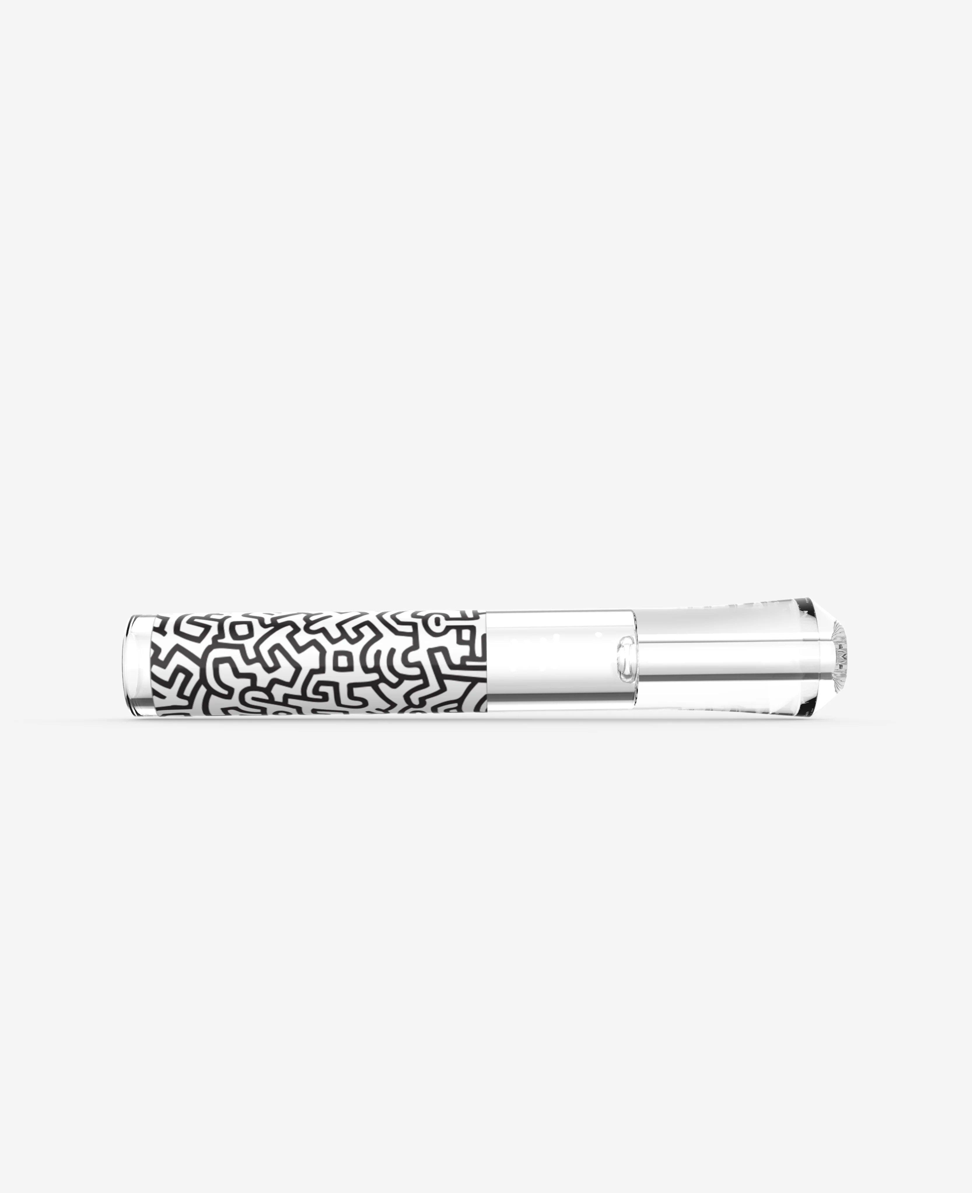 Front view of Keith Haring glass taster illustrating its compact size and artwork