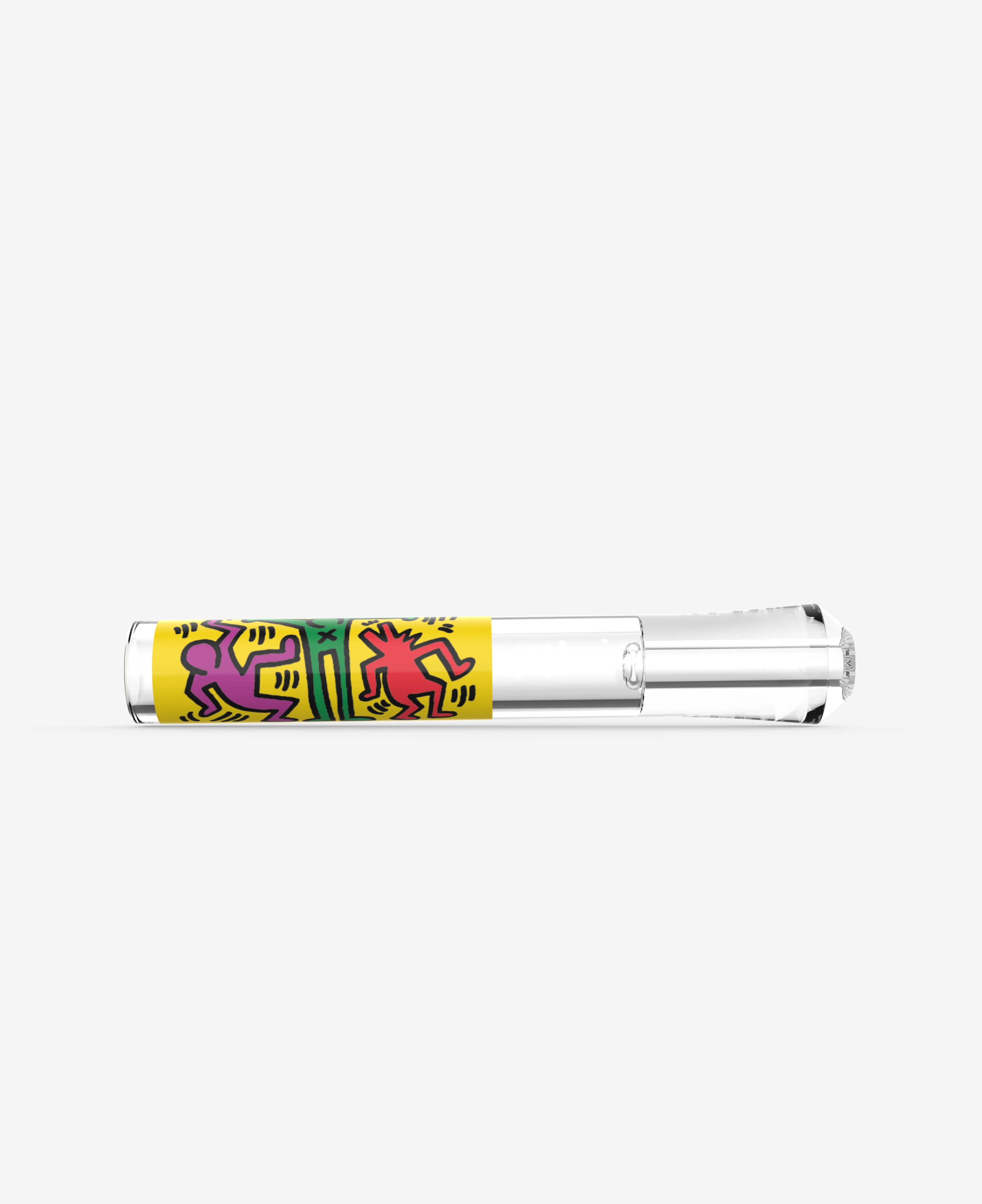 Front view of Keith Haring glass taster illustrating its compact size and artwork