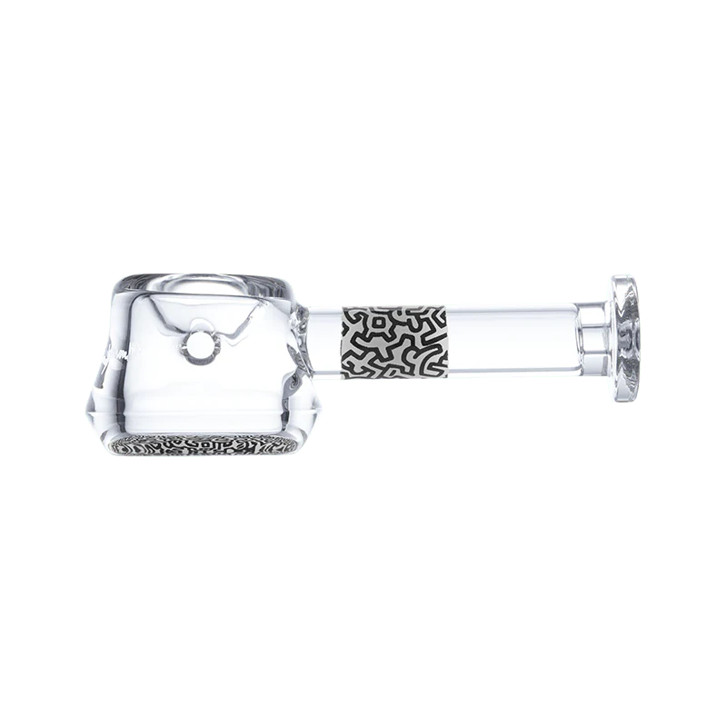 Keith Haring artistic glass spoon pipe showcasing vibrant colors and design from the side.