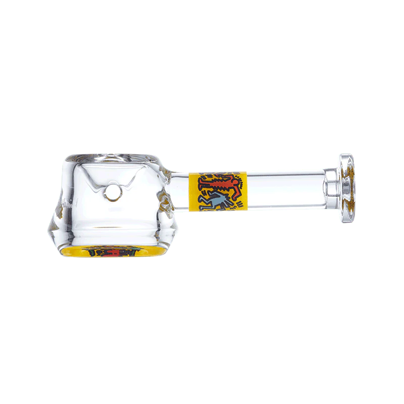 Lifestyle shot of the artistic glass pipe in use, illustrating its comfortable grip and airflow design.