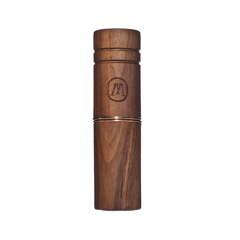 Chic glass pre-roll holder displaying pre-rolls on a coffee table