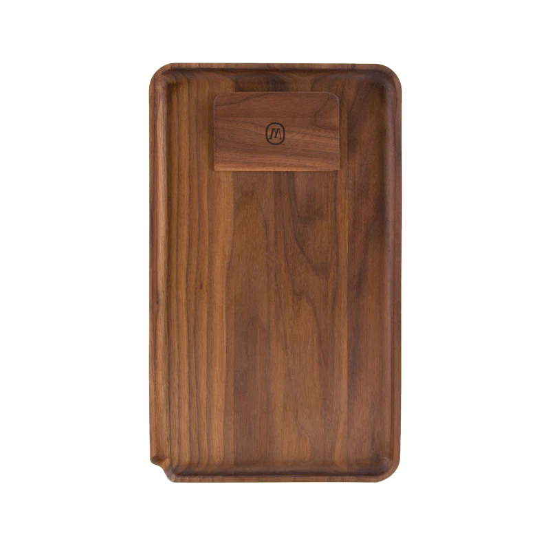 Black walnut cannabis tray with carved edges, ideal for rolling herbs