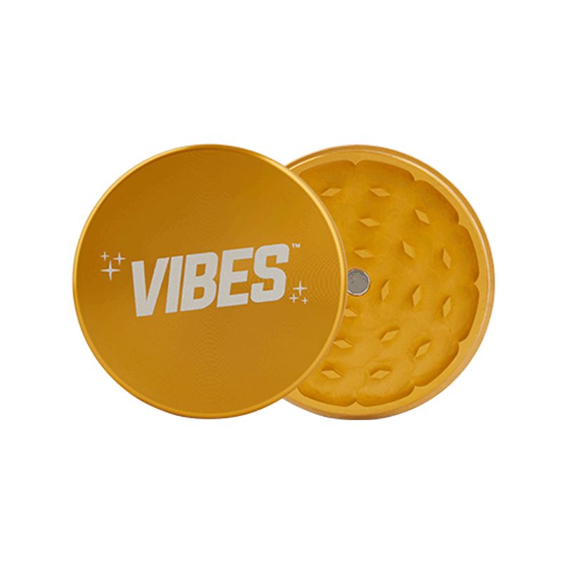 Vibes grinder with the magnetic lid open, demonstrating its easy-to-use design.