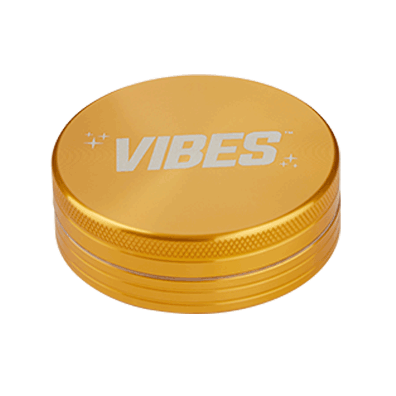 Vibes Portable Aluminum Herb Grinder from the side showing its compact size and design.