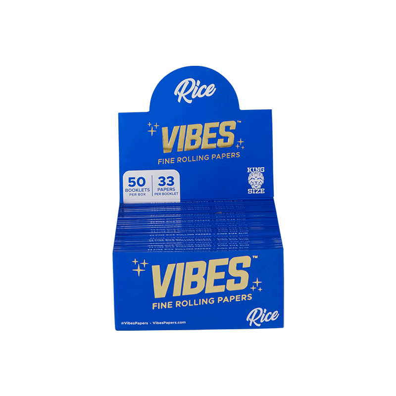 User  rolling a joint with Vibes Premium King Size Slim Rolling Papers, emphasizing ease of use.