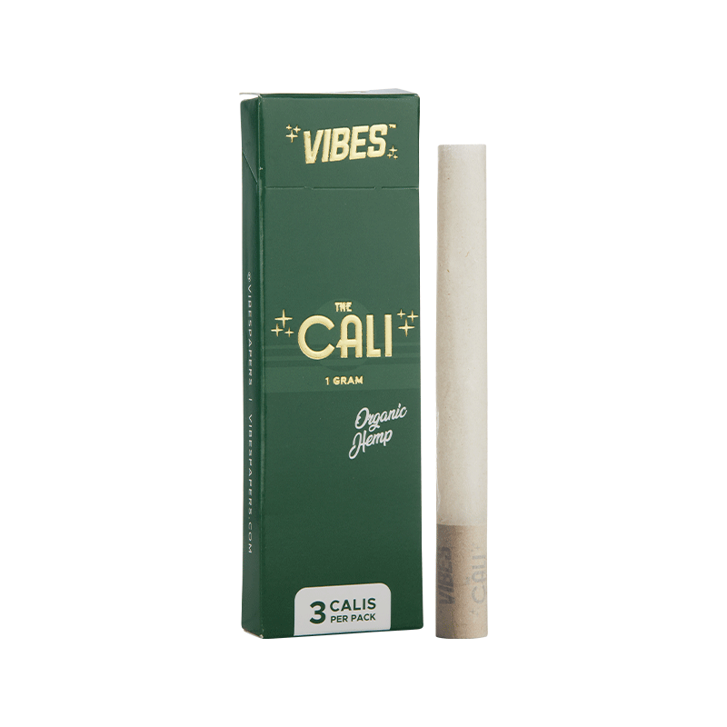 Lifestyle image of a user rolling with Vibes Cali papers for clean flavor