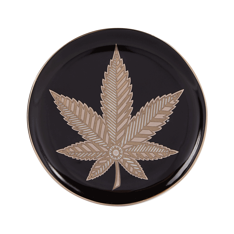 Elegant porcelain coaster on a coffee table, showcasing its stylish design.