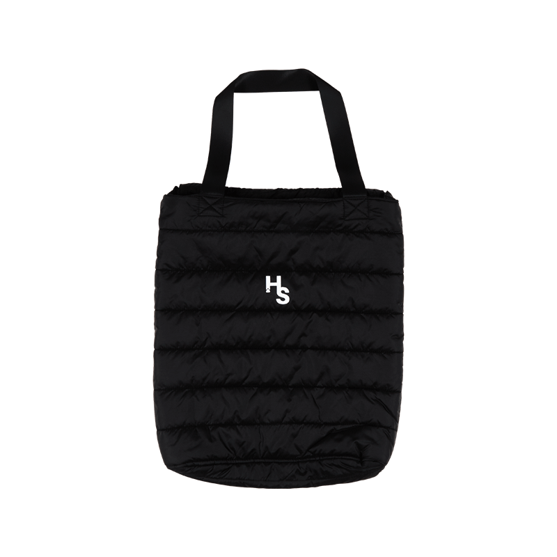 Premium Packable Down Tote Bag in a stylish setting, perfect for travel and gym use.