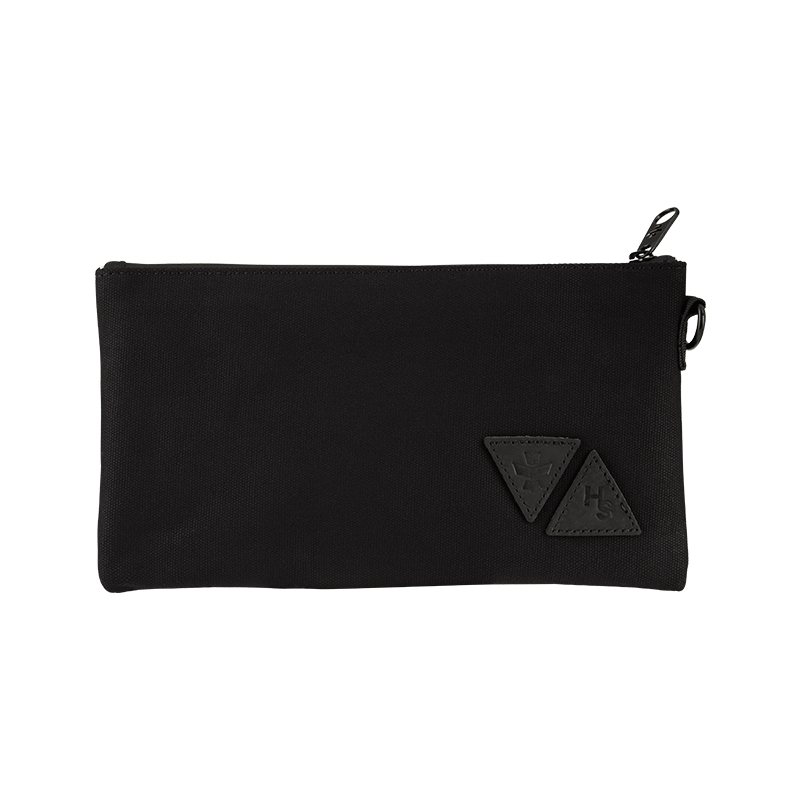 Close-up of the black canvas luggage with odor control features