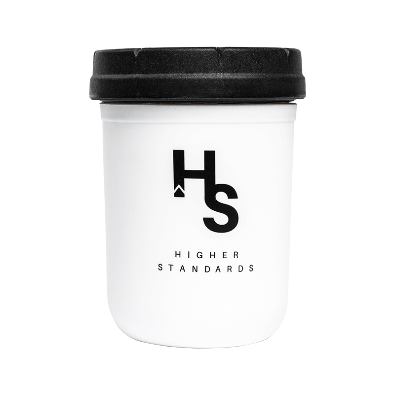 Eco-friendly stash jar for cannabis with silicone koozie, showcasing its sleek design and vibrant color.