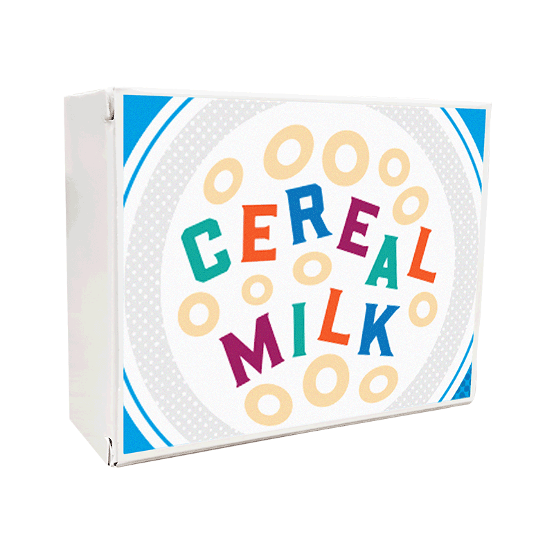 Top-down view of the Cookies Cereal Milk puzzle box showing the bold logo design