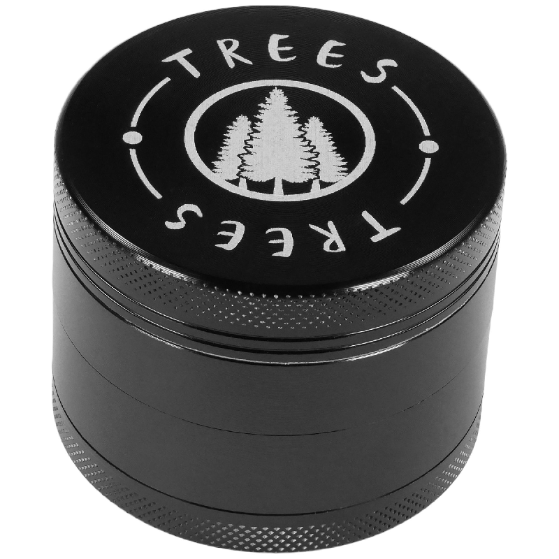 Trees 4-Piece Herb Grinder with mesh screen and rhombus teeth in use