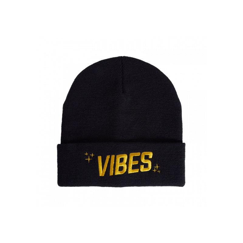 Close-up of VIBES embroidered beanie showing logo detail