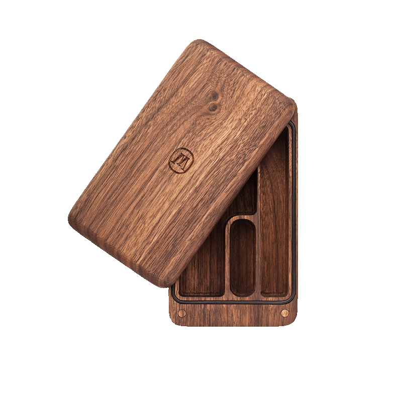 Close-up of the black walnut stash box showing herb compartments and lighter holder.