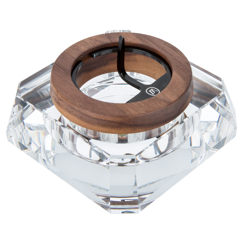 Elegant crystal ashtray with walnut base showcasing its design and functionality.